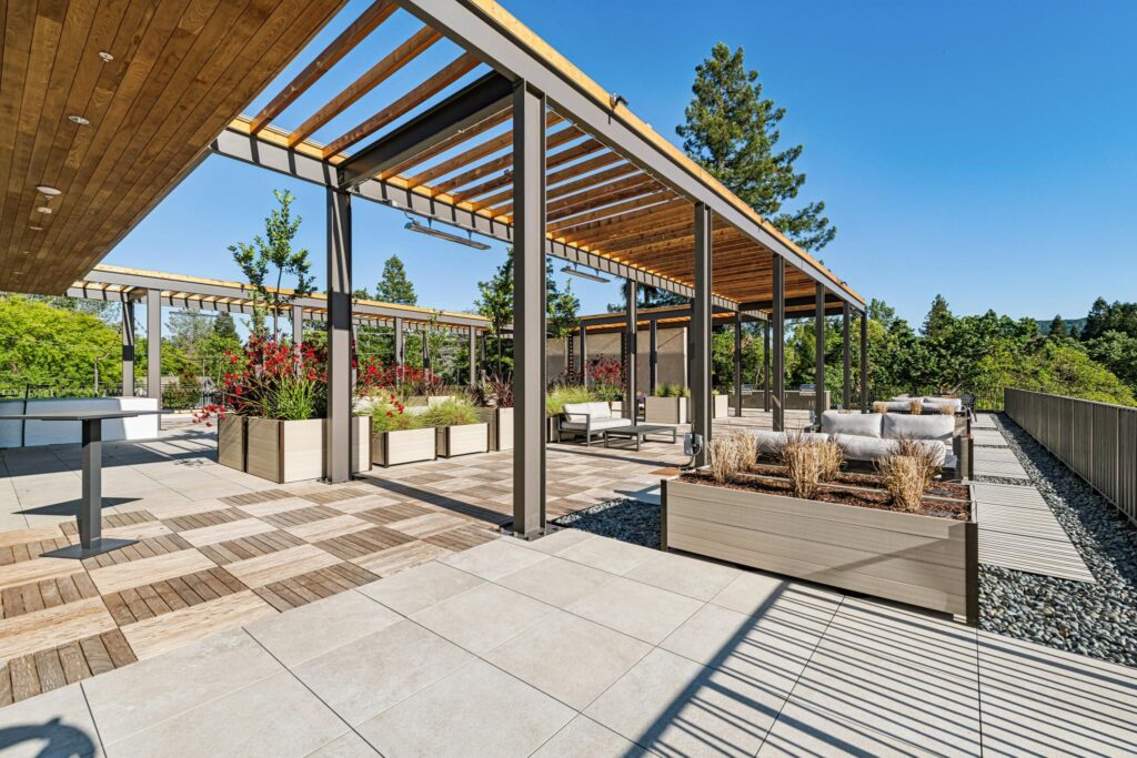 Residents gathering on The Nova rooftop terrace at sunset, the social side of active adult living in Danville